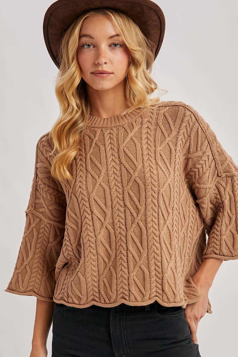 OVERSIZED BELL SLEEVE CABLE KNIT SWEATER